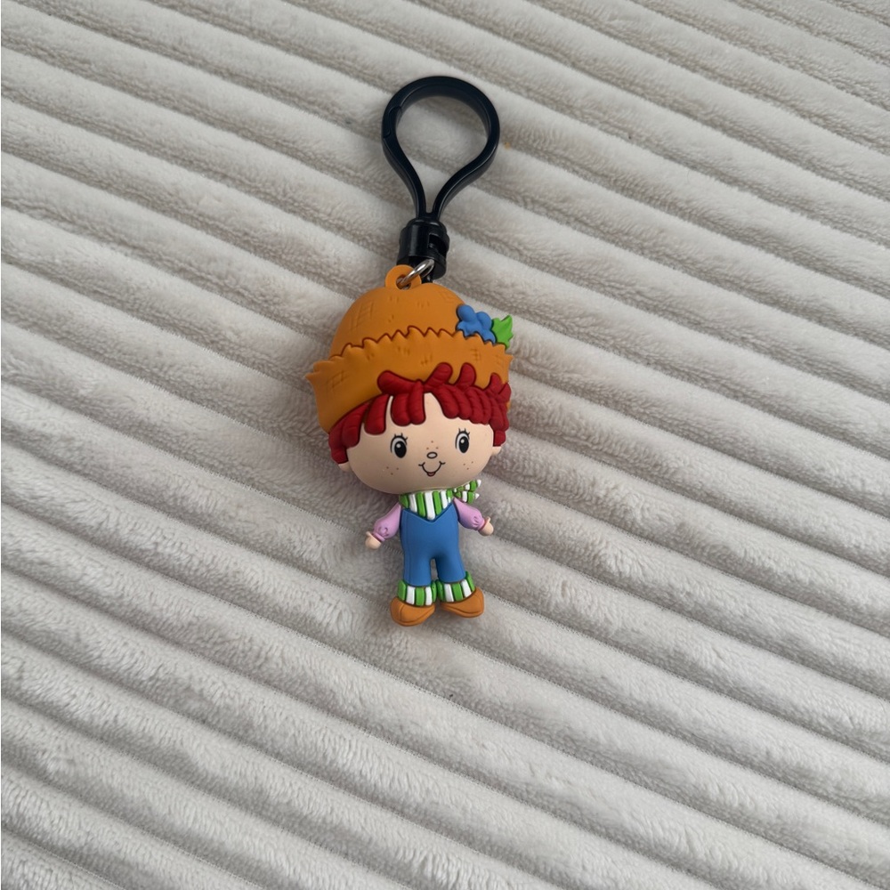 Huckleberry Pie from the Strawberry Shortcake series key chain, bag clip